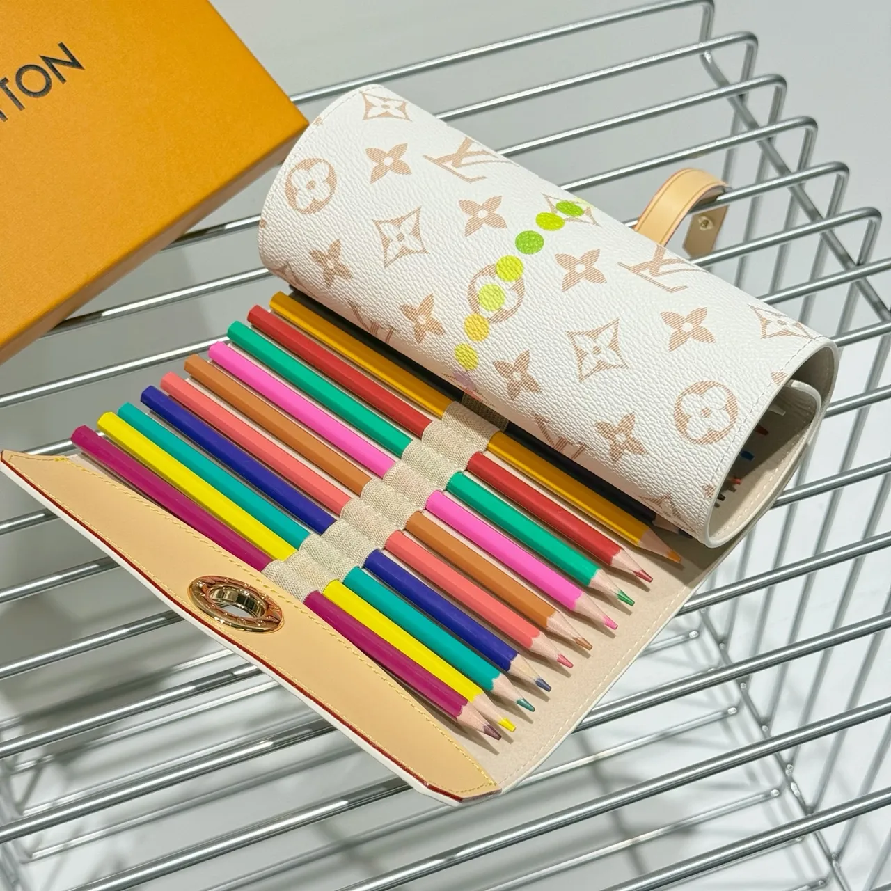 Louis Vuitton Beige Gold Cylindrical Roll-Up Monogram Canvas Wristlet