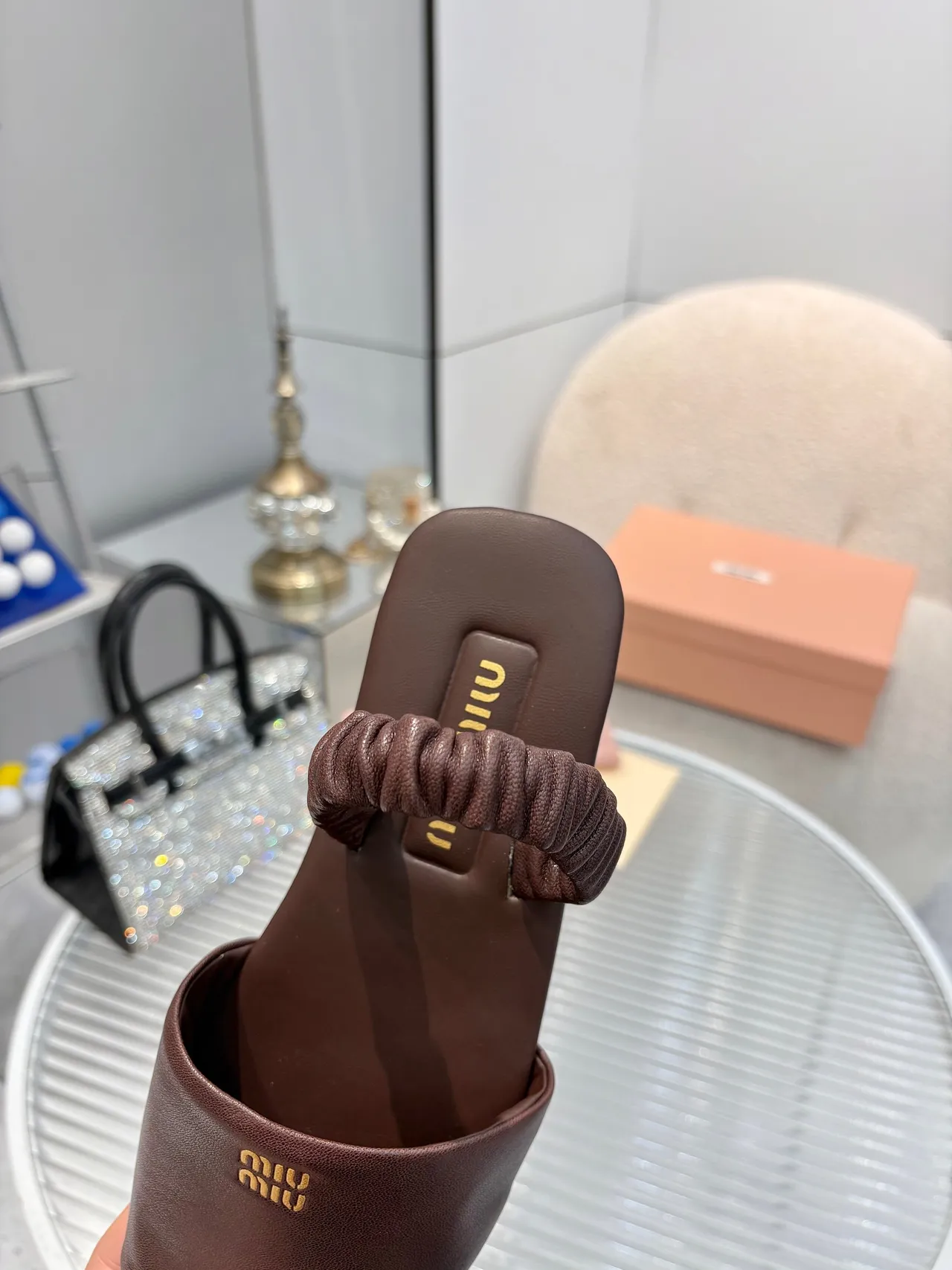 Miu Miu Black Gold Ruched Knotted Strap Logo Plaque Slippers