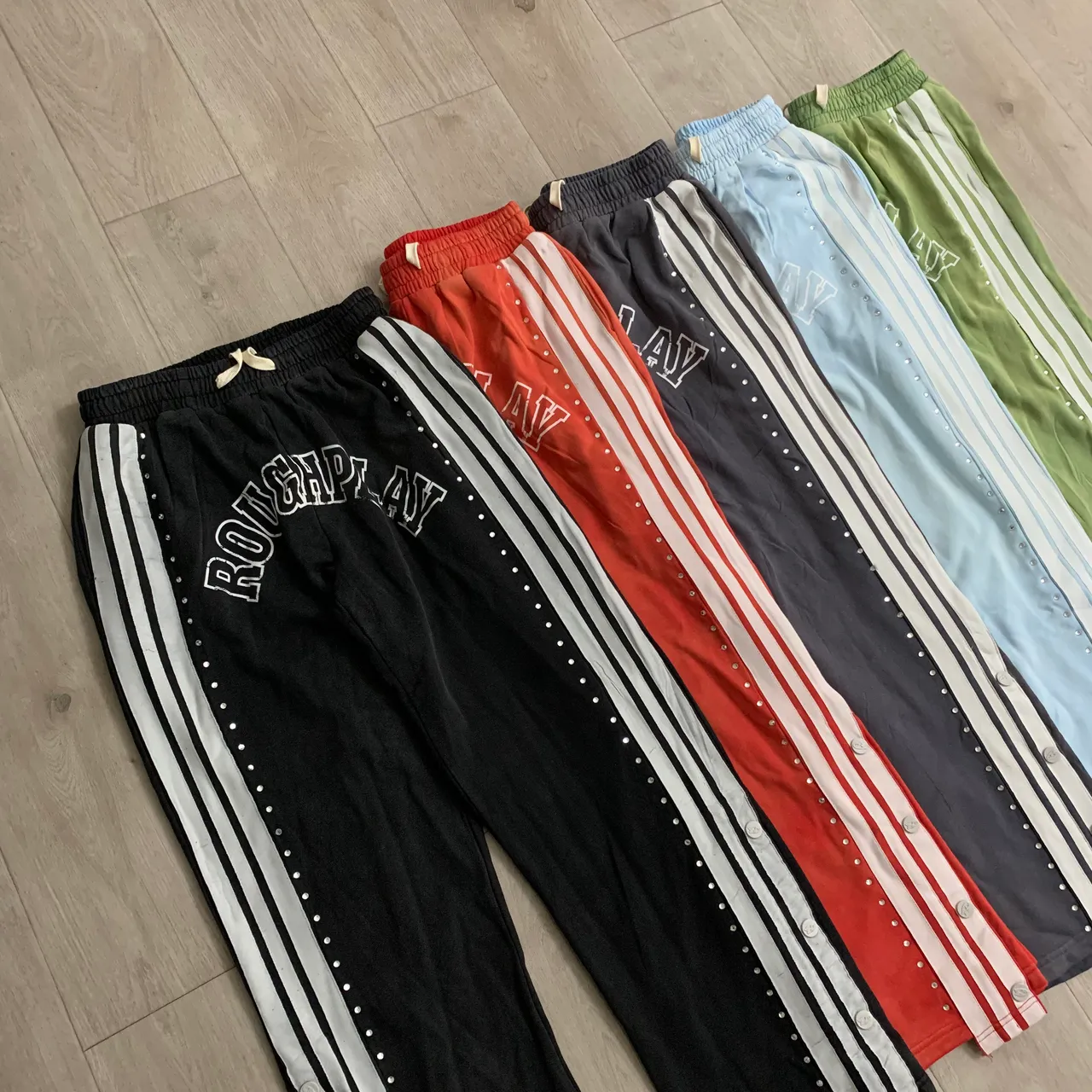 Roughplay Arch Logo Studded Stripe Sweatpants