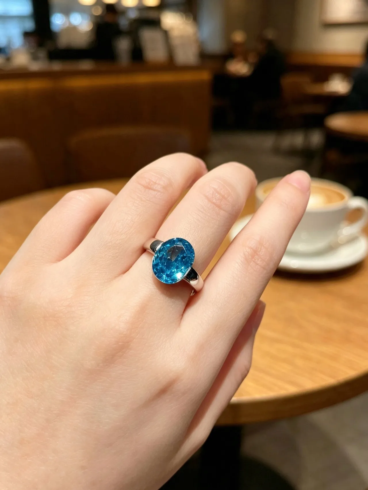 Oval Faceted Blue Gemstone Split Shank Ring