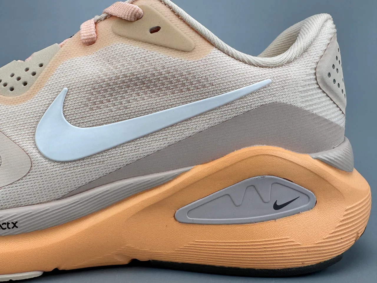 Nike Beige Orange Engineered Mesh Upper Sculpted Midsole Running Shoes