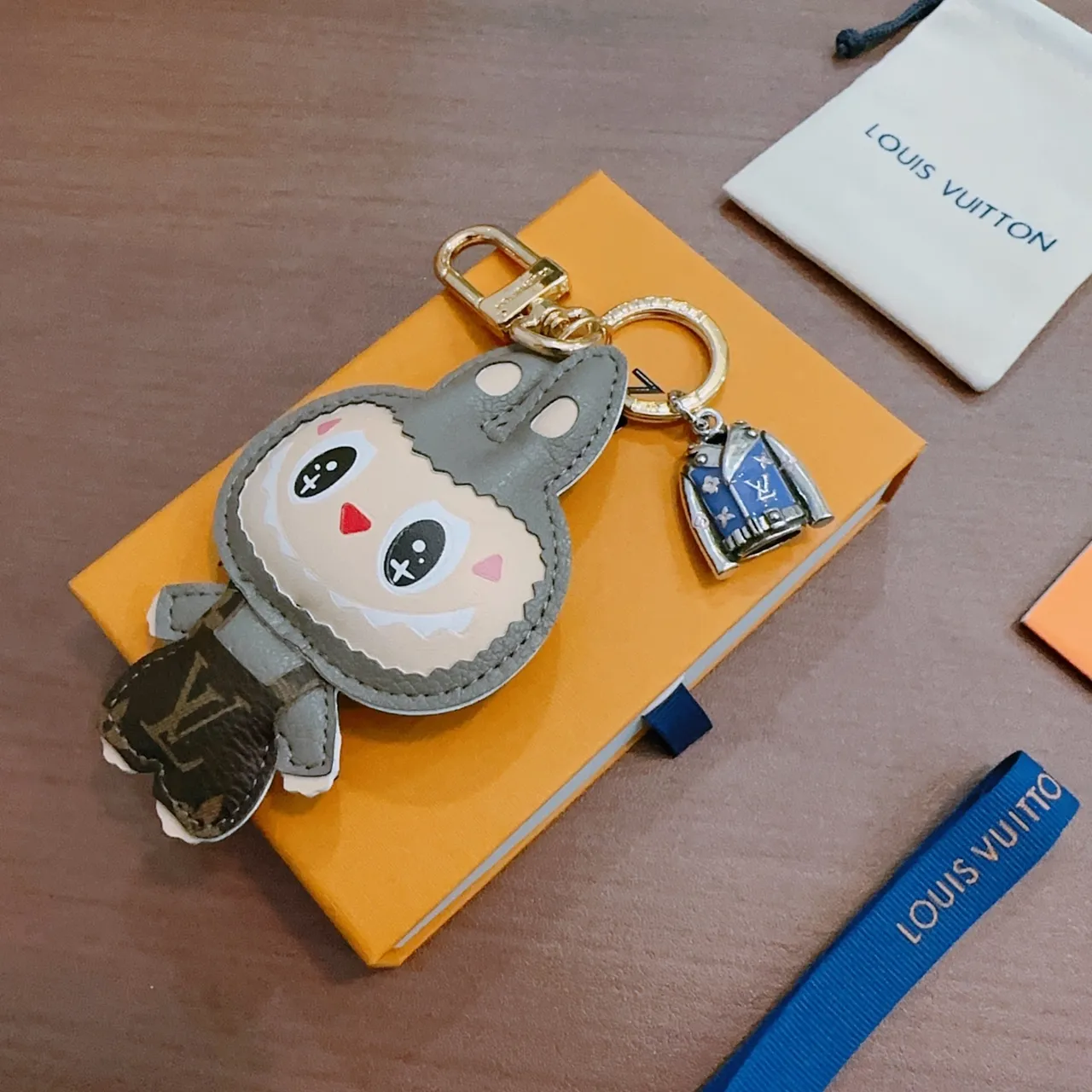 Louis Vuitton Gray Beige Plush Character Design Leather-Trimmed Appliqué Phone Accessory