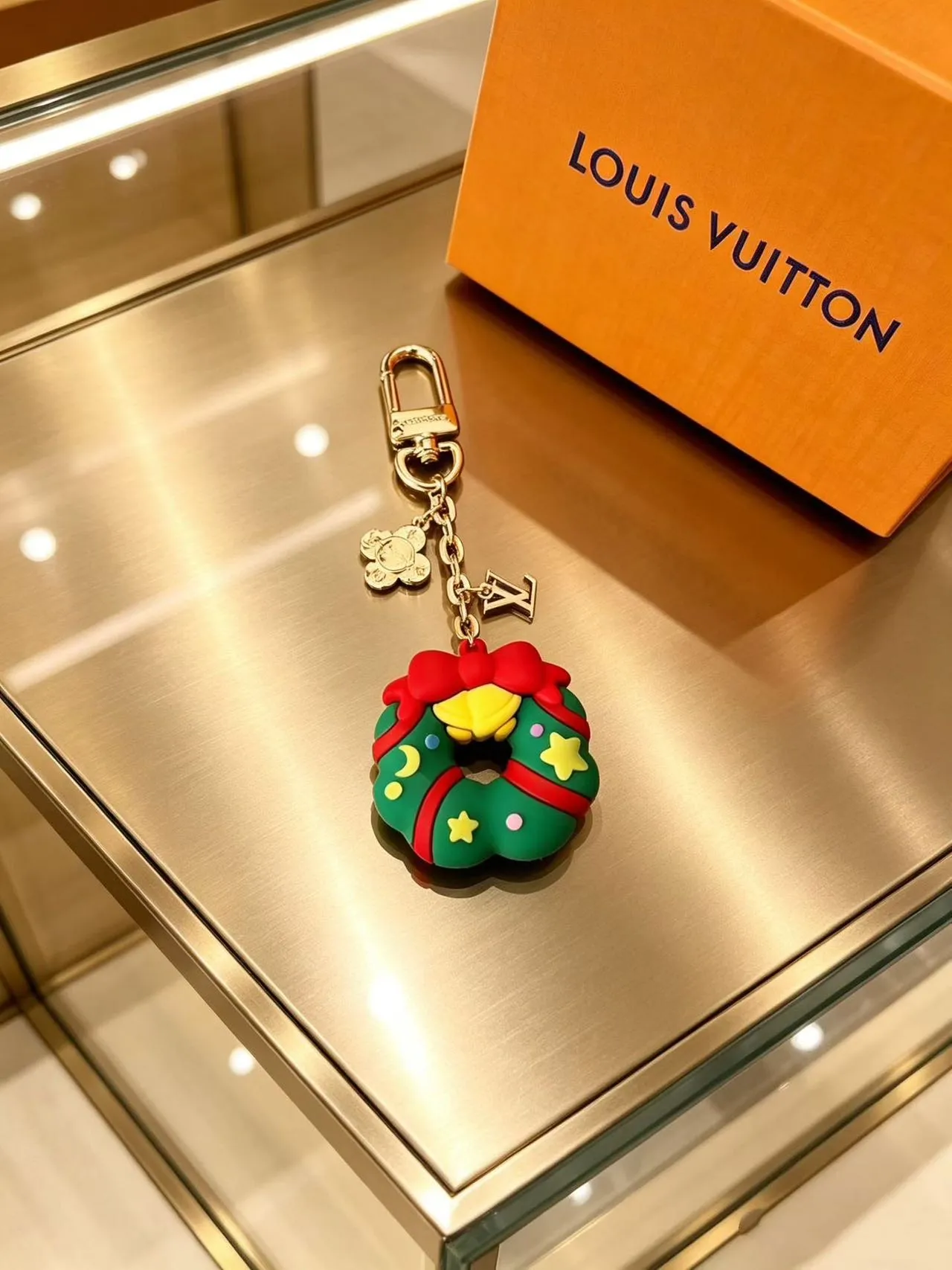 Louis Vuitton Multicolor Gold Resin Holiday Figurines Hardware Phone Accessory