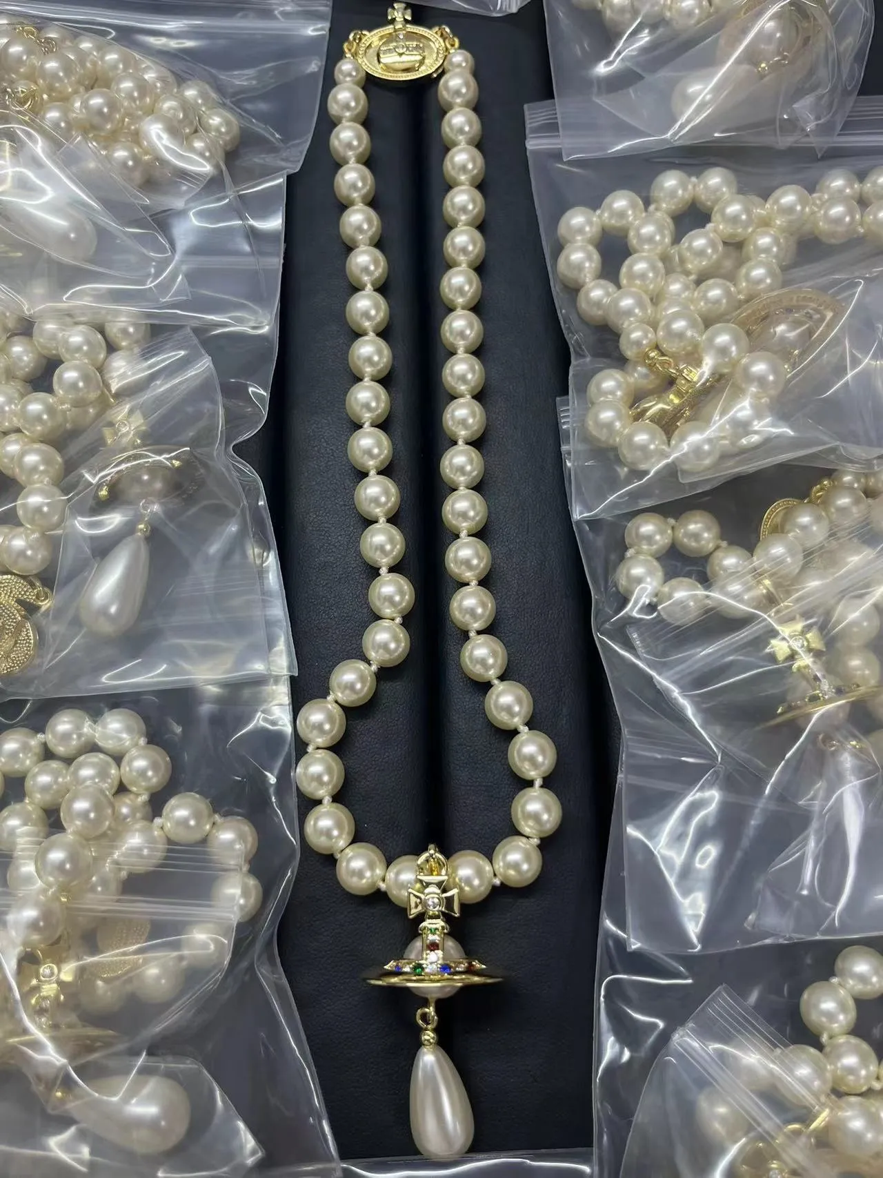Vivienne Westwood Orb Necklace Beige Gold Pearl Strand Pendant Necklace