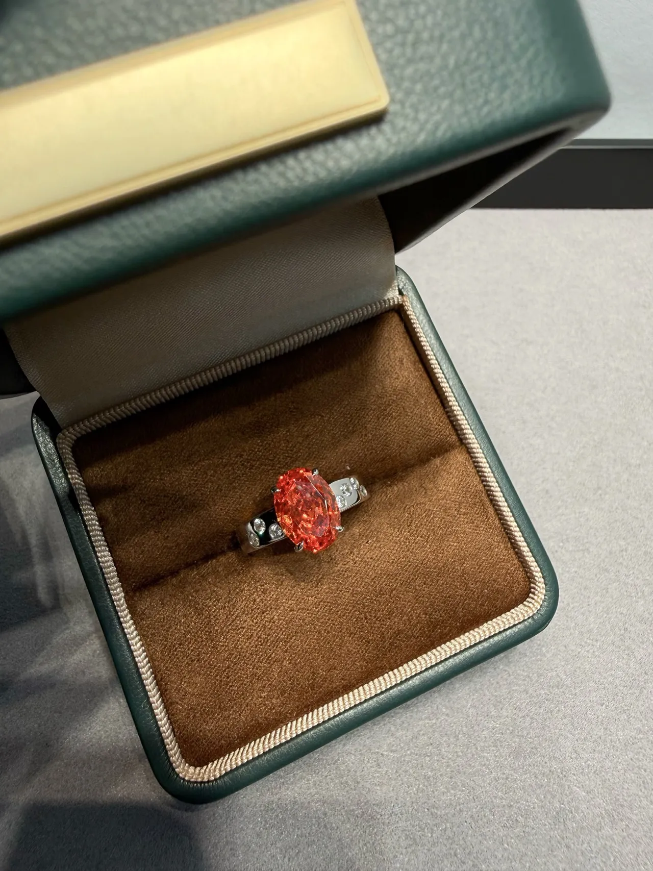 Orange Silver Oval-Cut Center Stone Four-Prong Solitaire Setting Ring
