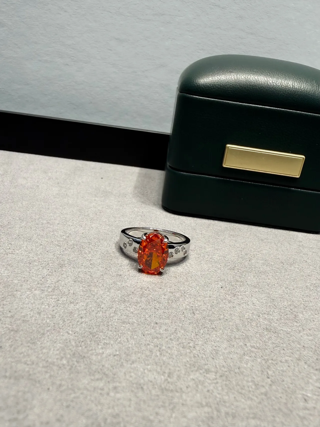 Orange Silver Oval-Cut Center Stone Four-Prong Solitaire Setting Ring