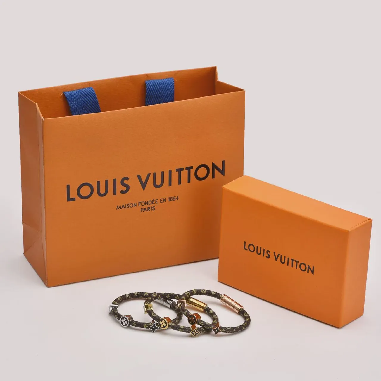 Louis Vuitton Brown Gold Braided Monogrammed Cord Rotating Enamel Charms Bracelet