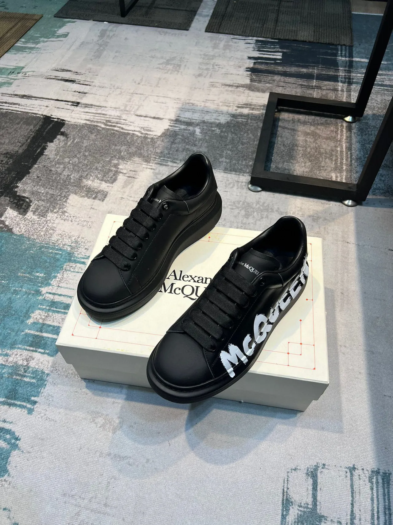 Alexander McQueen Oversized Sneaker Black White Platform Sole Graffiti-Style Logo Lifestyle Sneakers