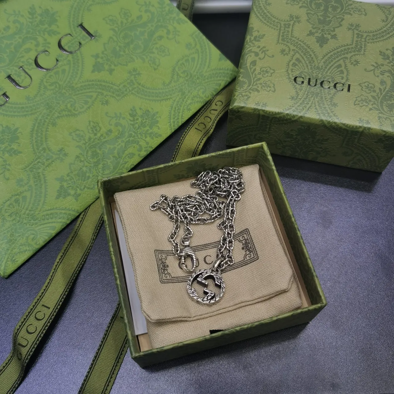Gucci Silver Interlocking Double-G Pendant Engraved Laurel Wreath Border Necklace