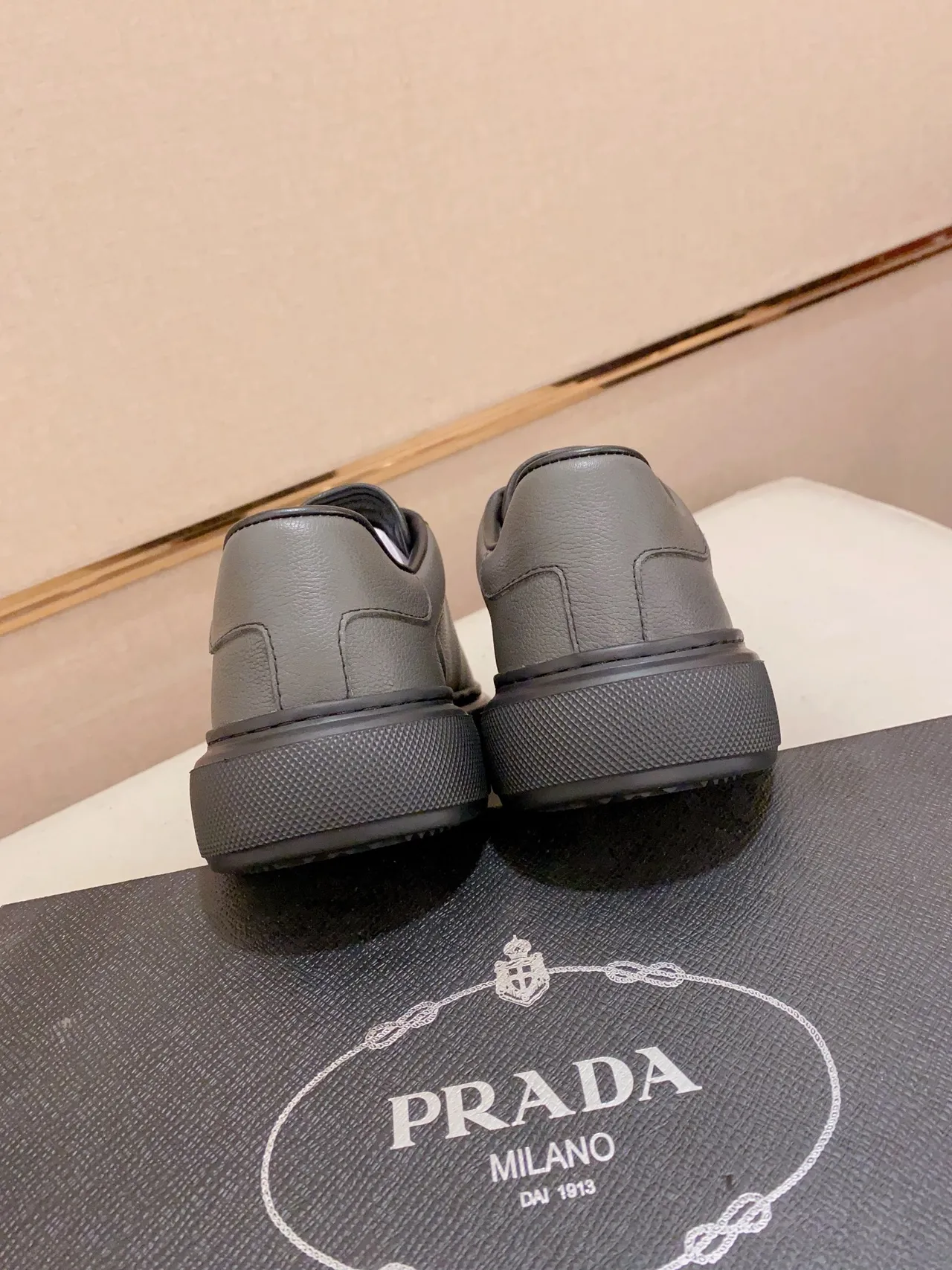 Prada Gray Black Leather Upper Triangular Metal Logo Lifestyle Sneakers