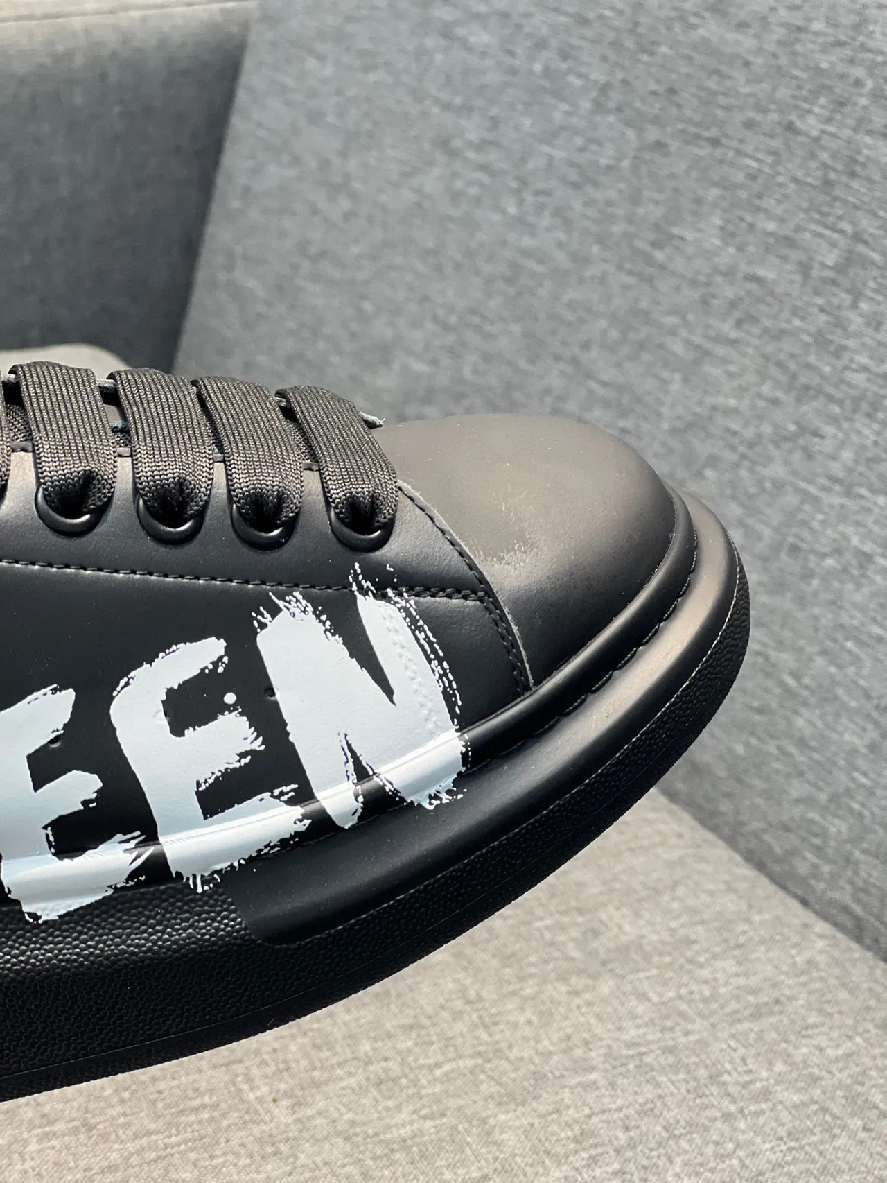 Alexander McQueen Oversized Sneaker Black White Platform Sole Graffiti-Style Logo Lifestyle Sneakers