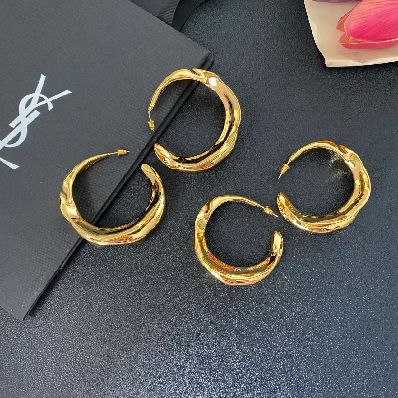 Saint Laurent Twisted Sculptural Gold Hoop Earrings