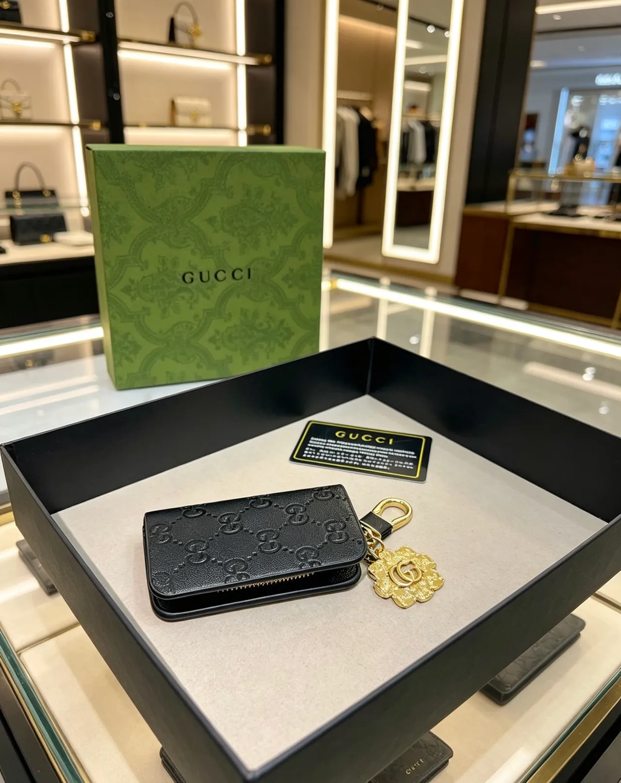 Gucci GG Monogram Black Gold Embossed Hardware Card Holder