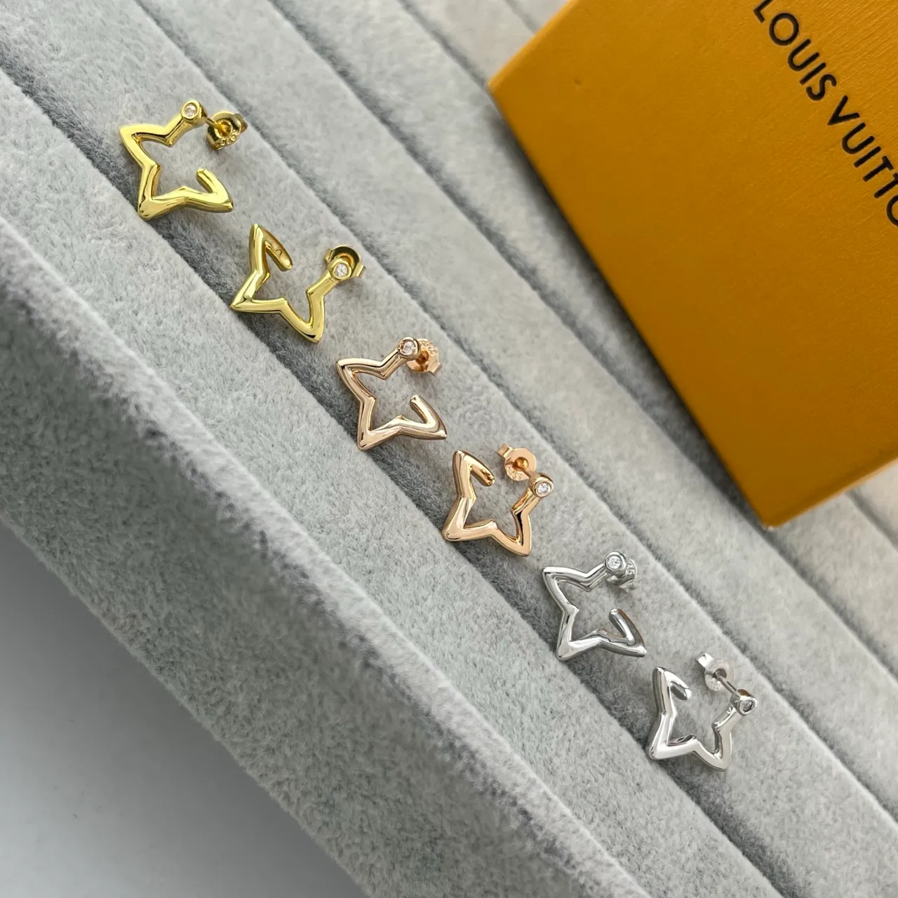 Louis Vuitton Gold Silver Star-Shaped Outline Hollow Silhouette Earrings