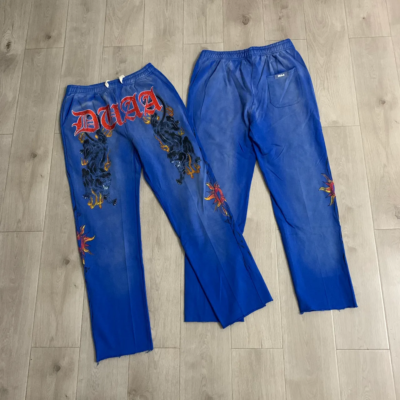 Blue Embroidered Panther Graphic Sweatpants