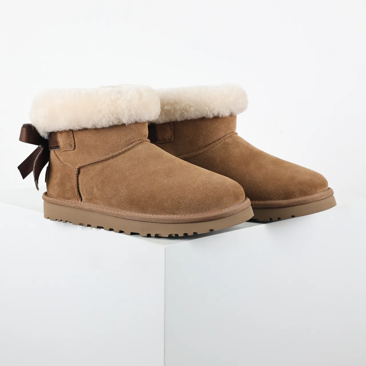 UGG Classic Mini Bow Tan Suede Ankle Boots