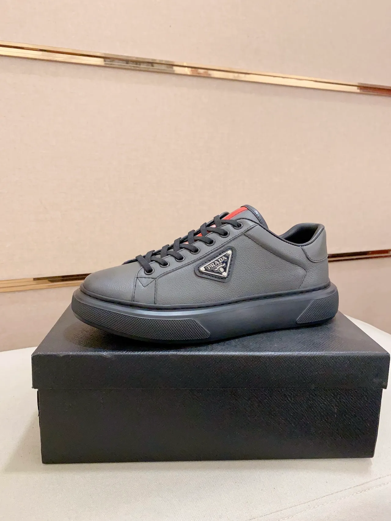Prada Gray Black Leather Upper Triangular Metal Logo Lifestyle Sneakers