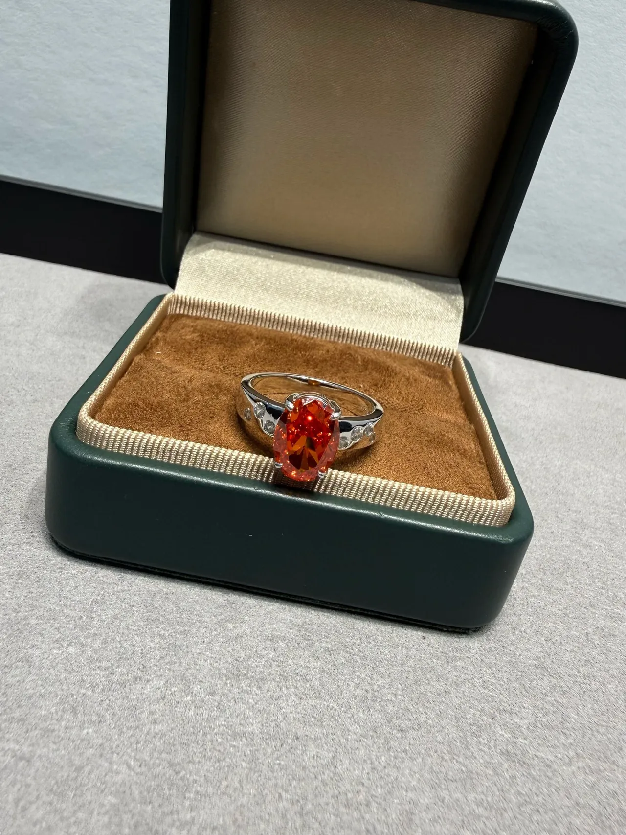 Orange Silver Oval-Cut Center Stone Four-Prong Solitaire Setting Ring