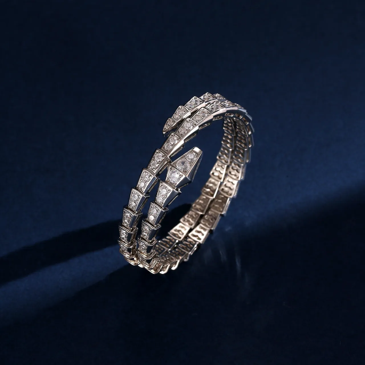 Bvlgari Gold Silver Coiled Serpentine Articulated Scale Motif Bracelet