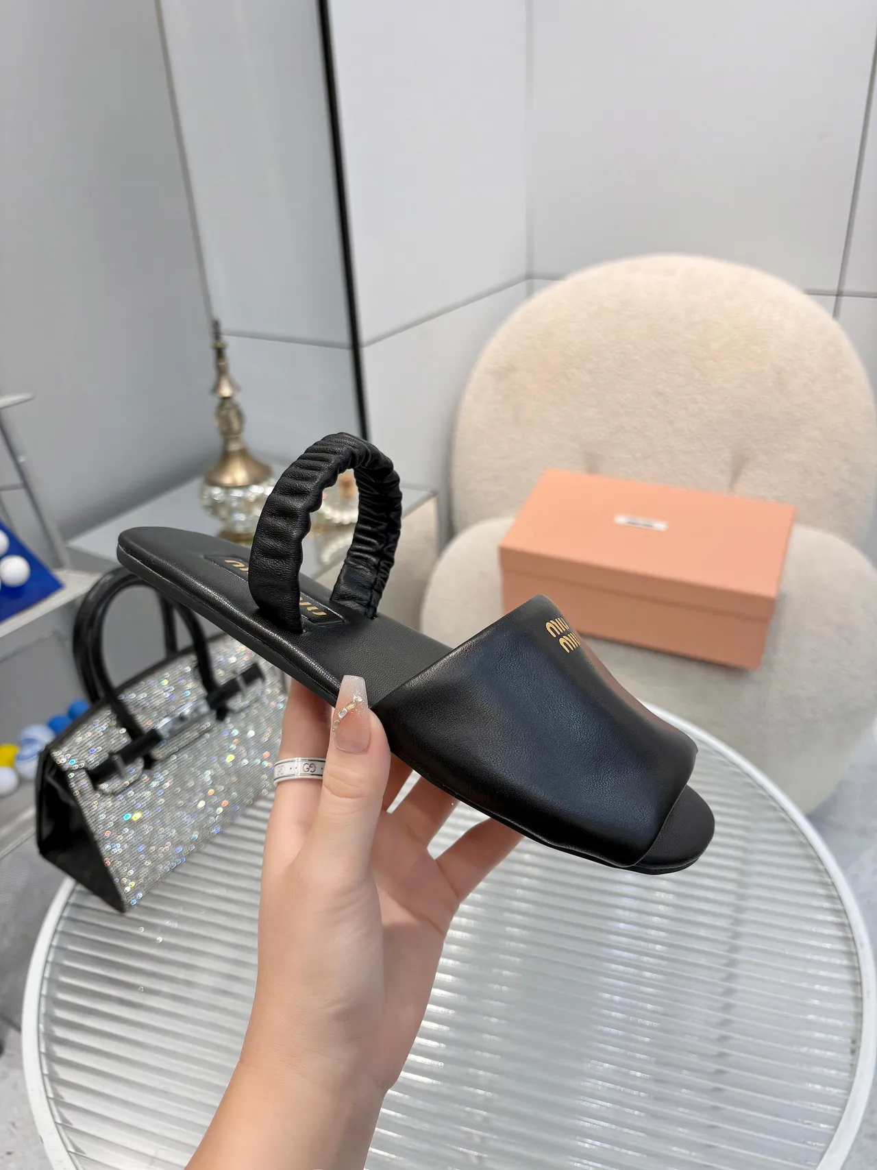 Miu Miu Black Gold Ruched Knotted Strap Logo Plaque Slippers