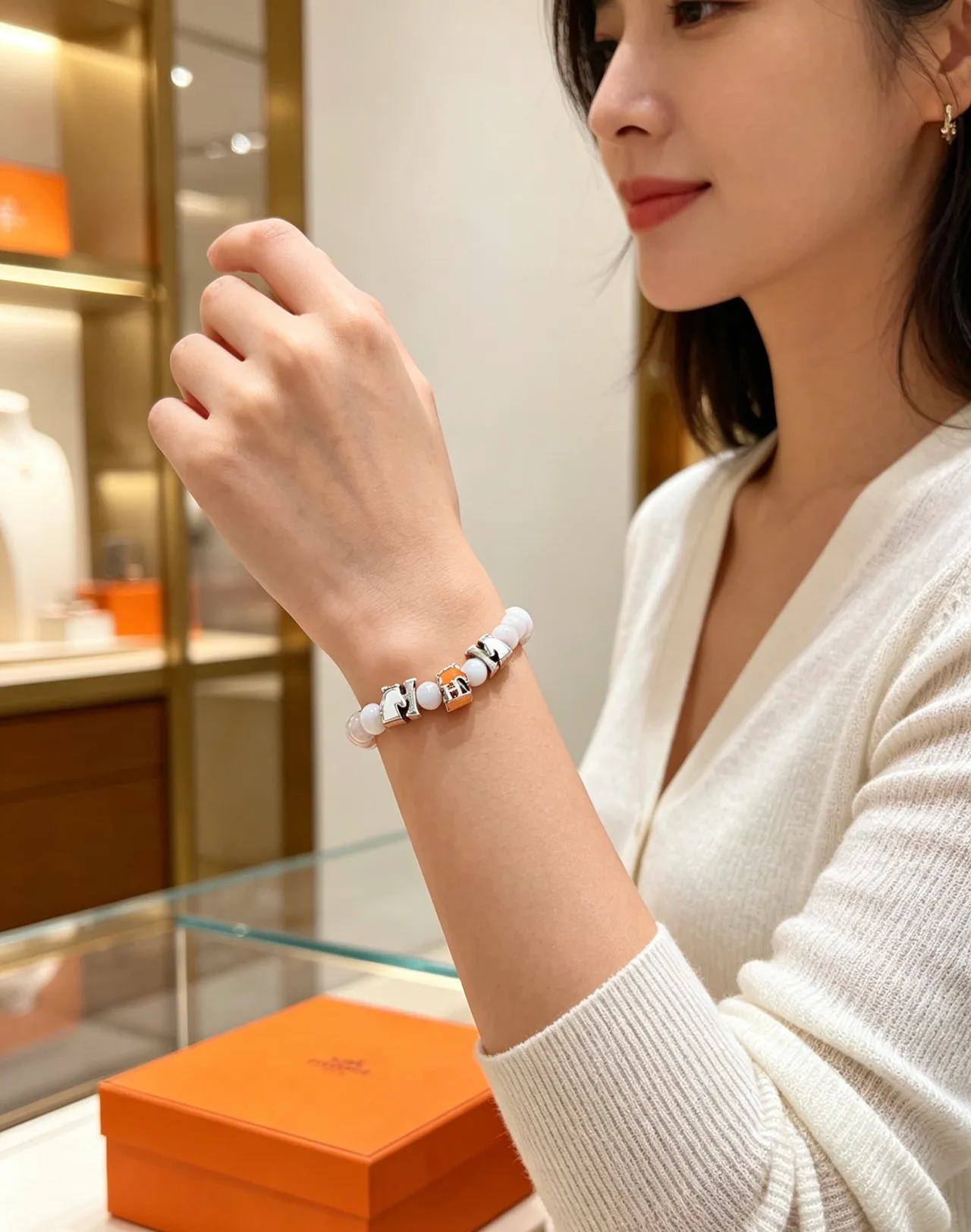 Hermès White Orange Beaded Enamel-Charm Bracelet