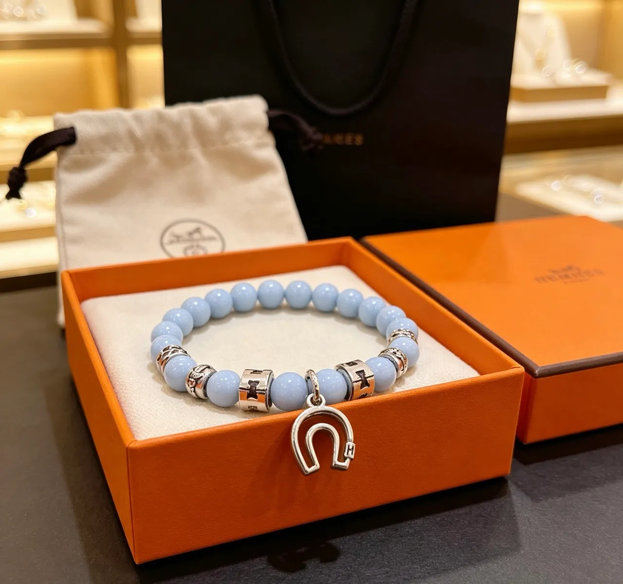 Gucci Beaded Light Blue Stone and Silver-Tone Horseshoe Charm Bracelet