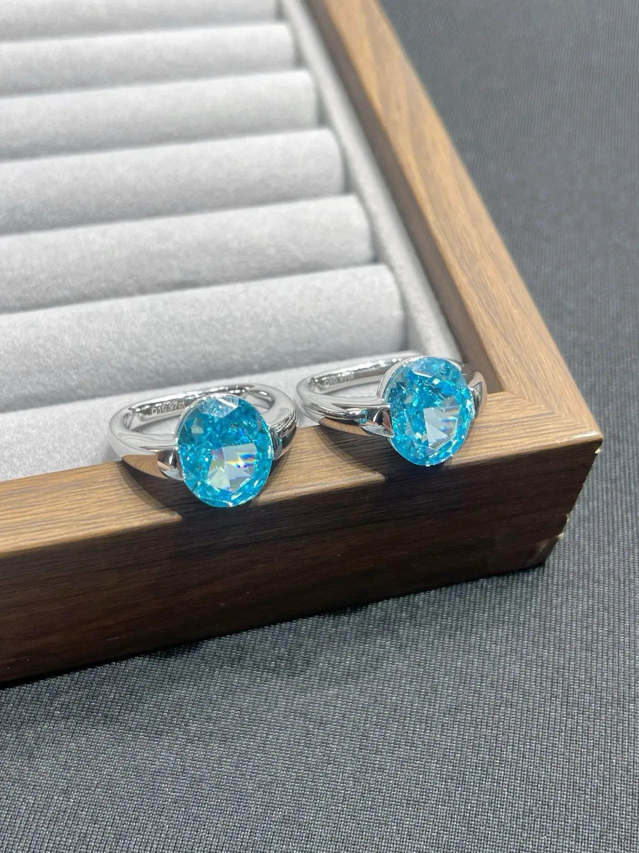 Oval Faceted Blue Gemstone Split Shank Ring