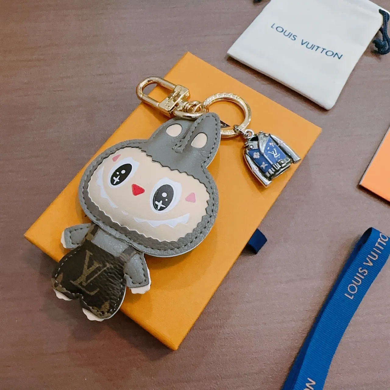Louis Vuitton Gray Beige Plush Character Design Leather-Trimmed Appliqué Phone Accessory