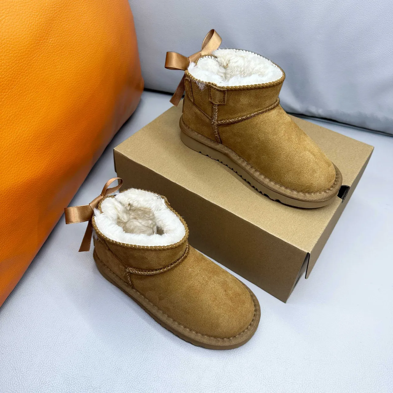 UGG Classic Mini Tan Suede Shearling-Lined Snow Boots