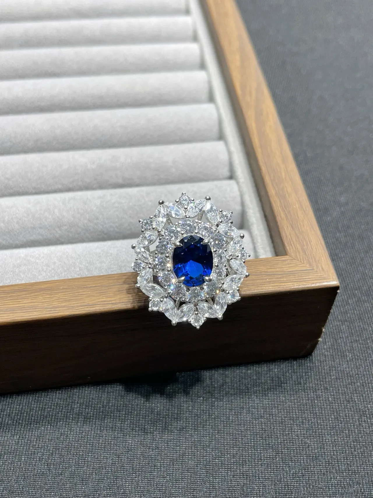 Oval Blue Gem Halo Stud Earrings