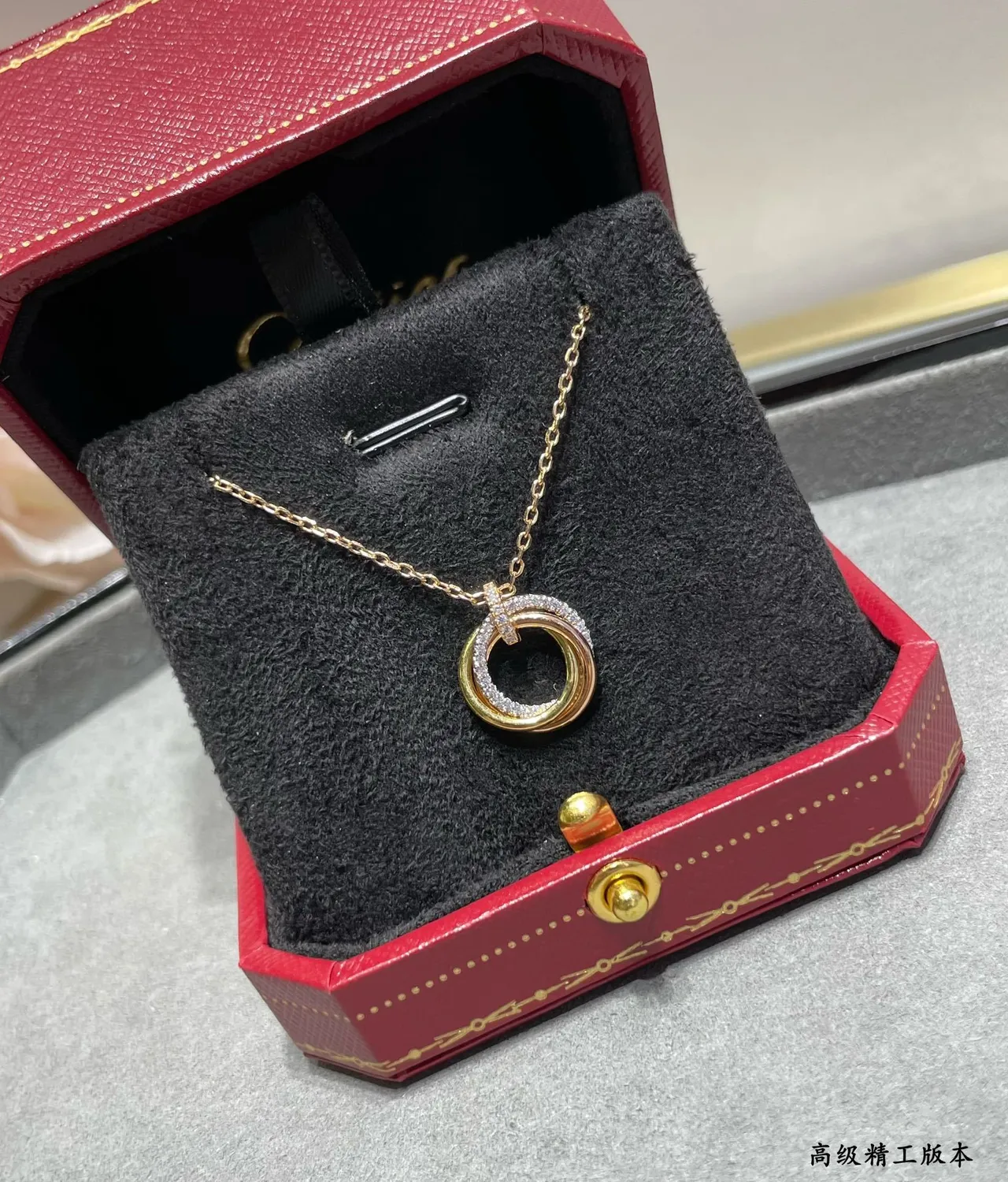 Cartier Gold Black Interlocking Double-Ring Pendant Pavé-Diamond Accent Necklace