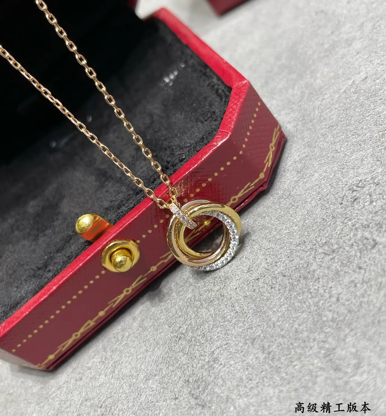 Cartier Gold Black Interlocking Double-Ring Pendant Pavé-Diamond Accent Necklace
