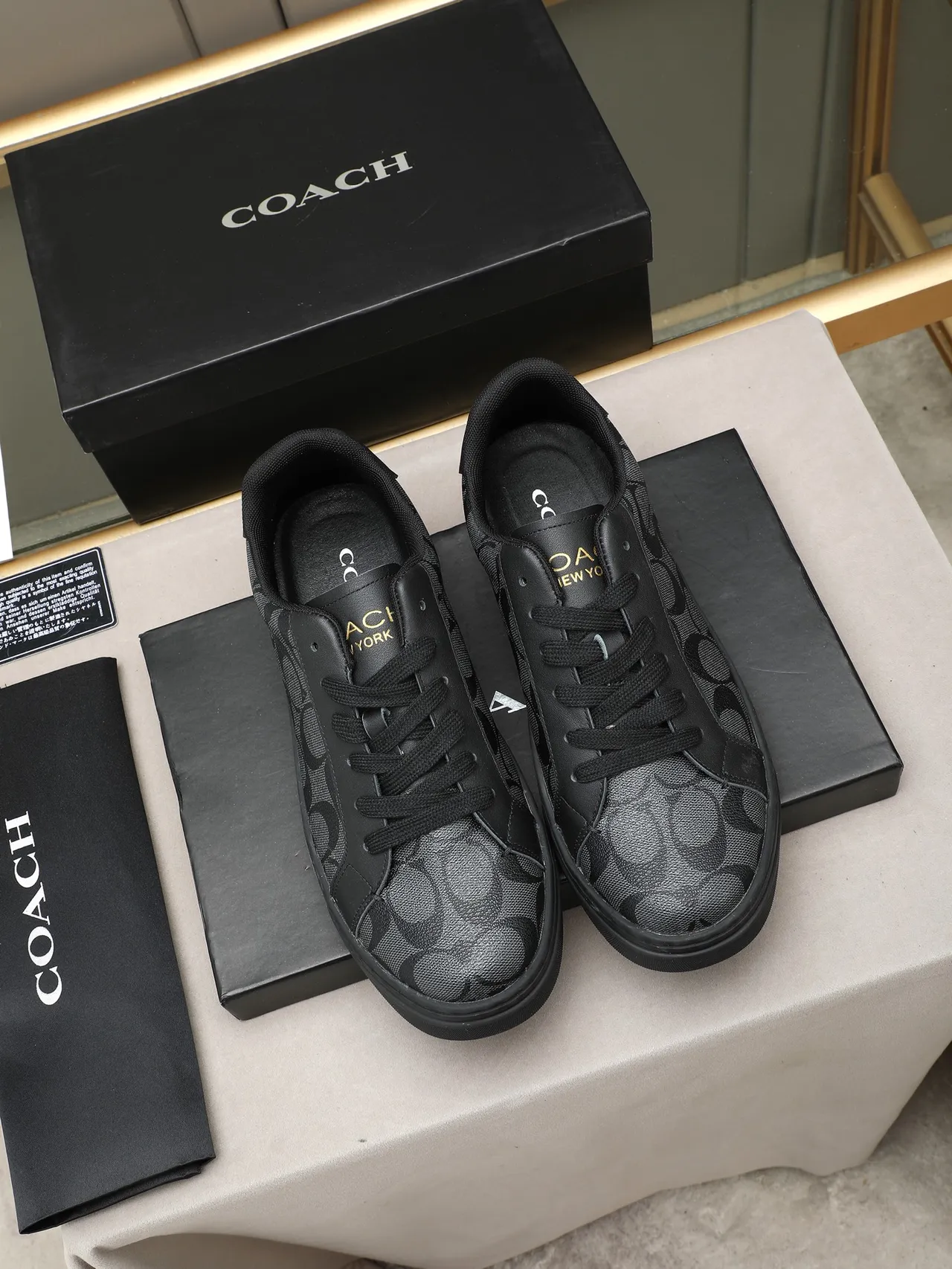 Coach Monogrammed Black Low-Top Lifestyle Sneakers