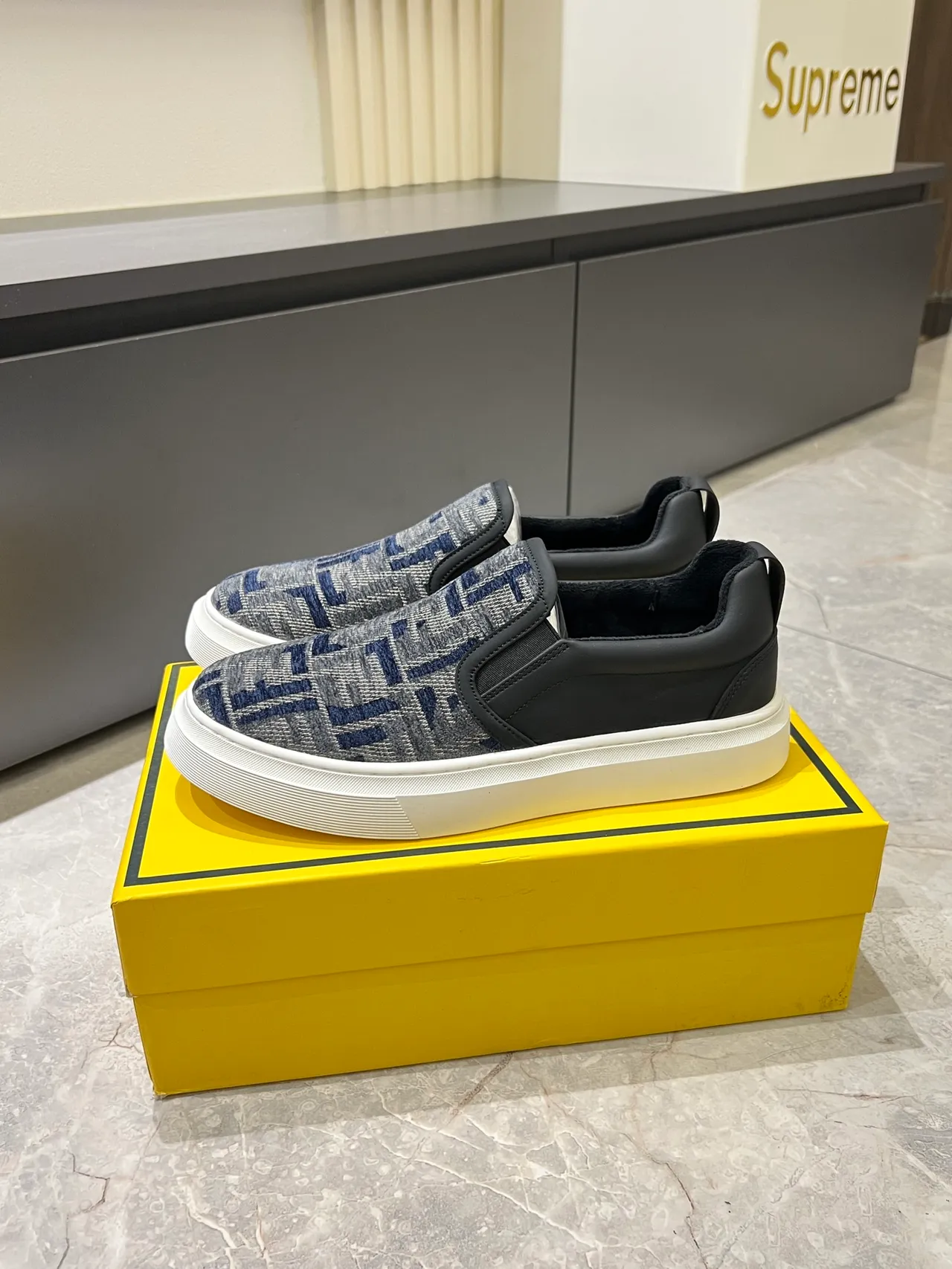 Supreme Slip-On Patterned Knit and Leather Lifestyle Sneakers