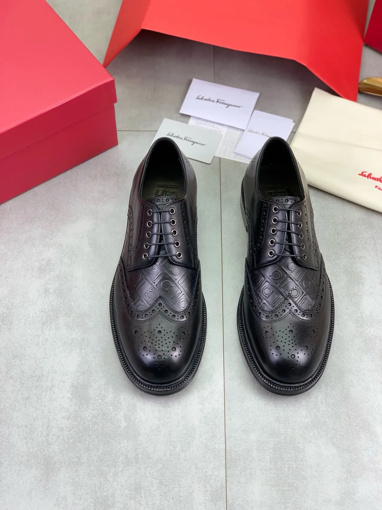 Salvatore Ferragamo Black Full Wingtip Embossed Logo Pattern Brogue