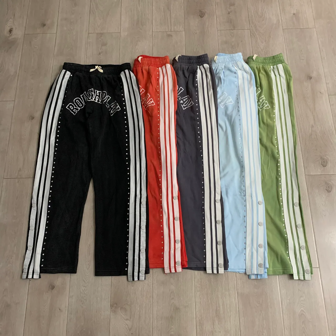 Roughplay Arch Logo Studded Stripe Sweatpants