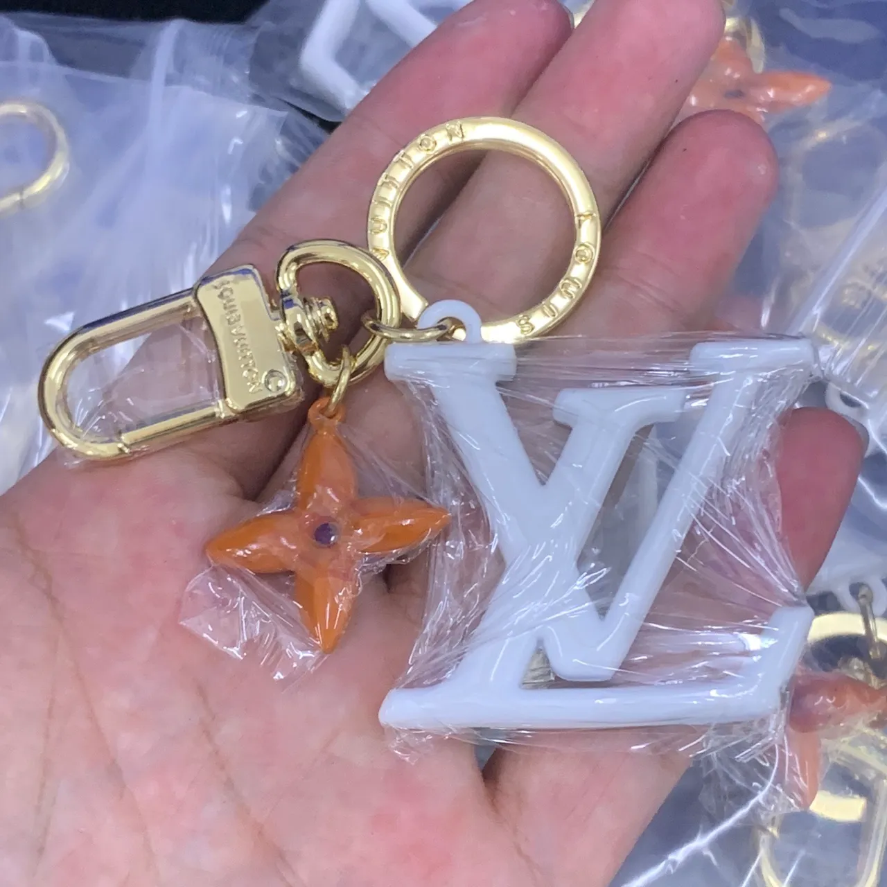 Louis Vuitton Monogram Flower White Orange Monogrammed Gold-Tone Hardware Phone Case
