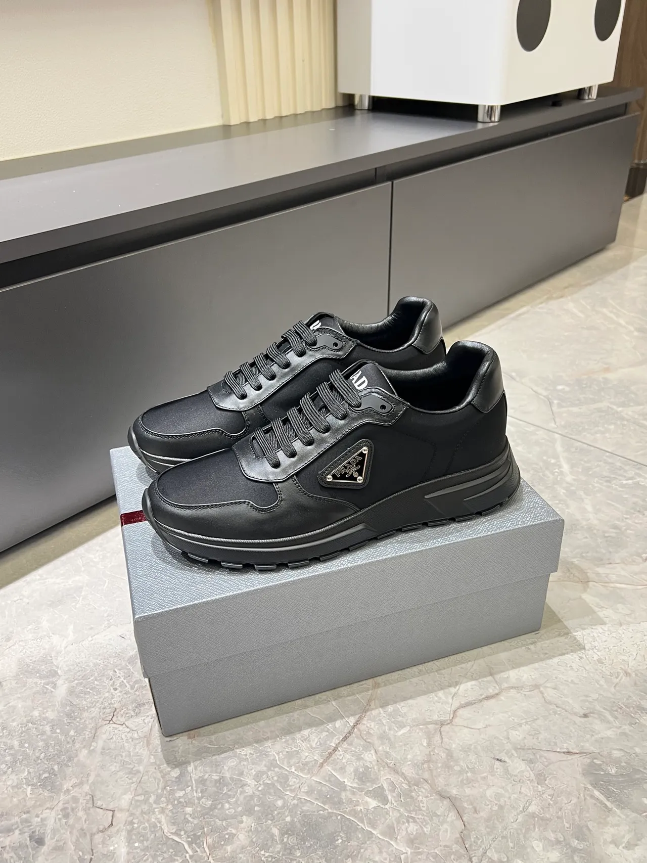 Prada Black Gray Leather And Textile Upper Metallic Triangle Logo Plaque Lifestyle Sneakers