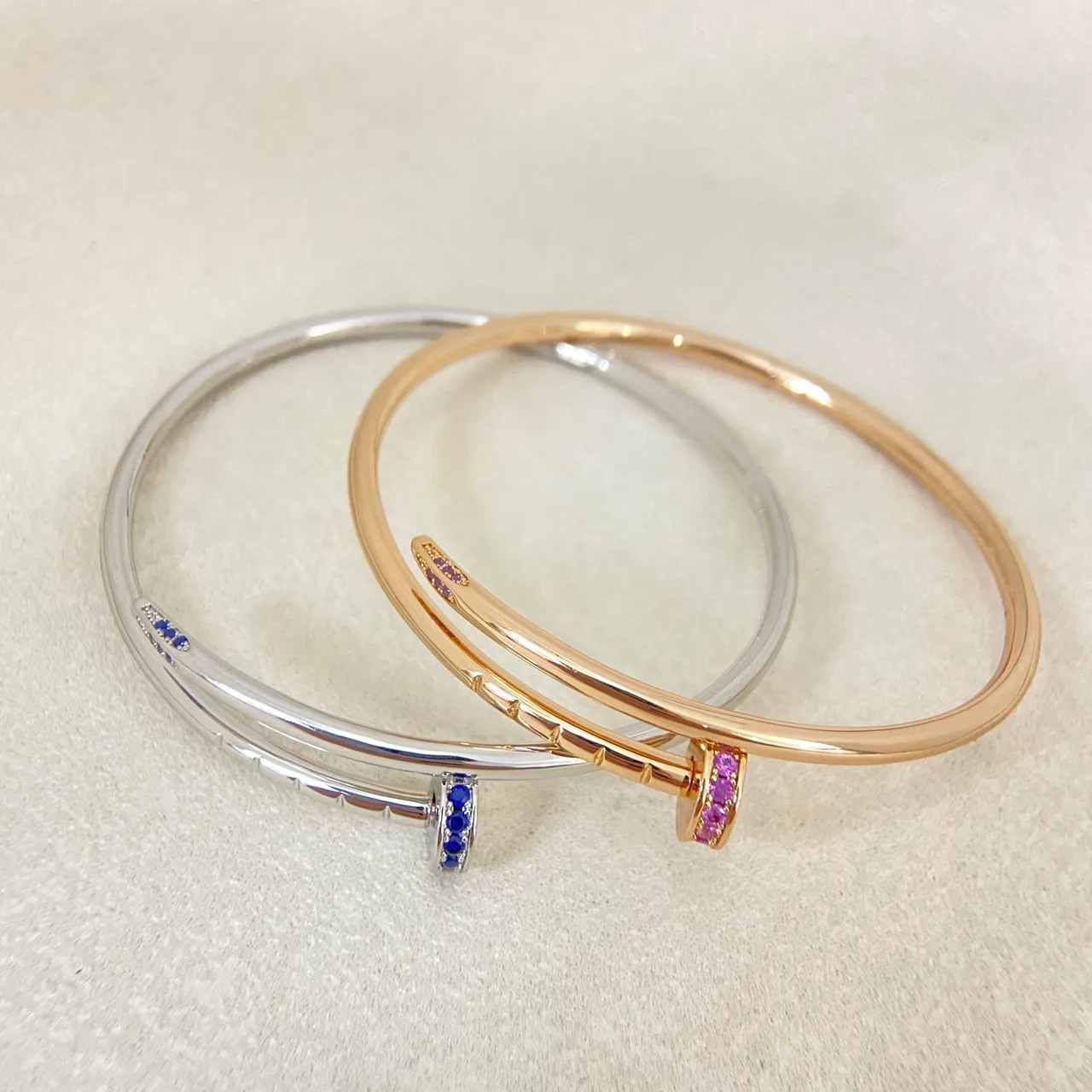 Tiffany & Co. Juste un Clou Blue Sapphire and Pink Sapphire Bangle Bracelets
