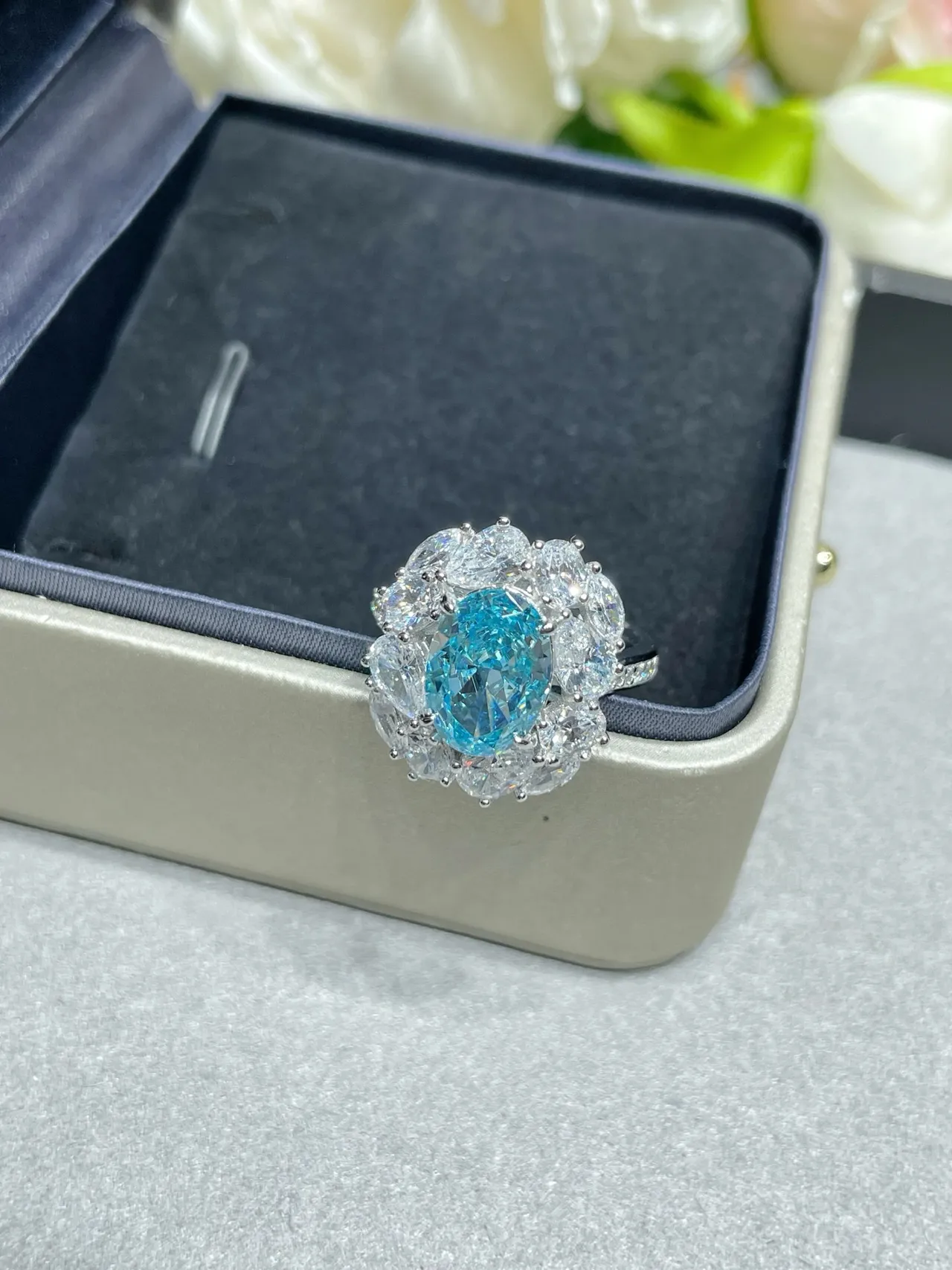 Oval Blue Gemstone Halo Cluster Ring