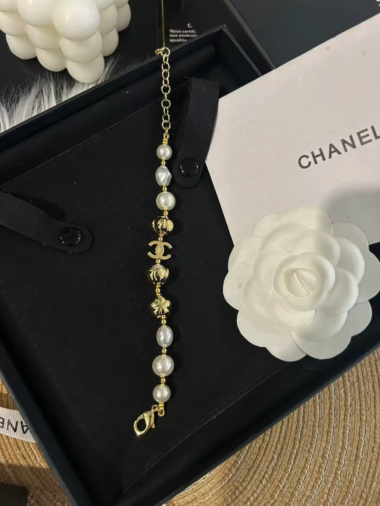 Chanel Pearl and CC Charm Bracelet Gold White Chain Baroque Pearls Bracelet