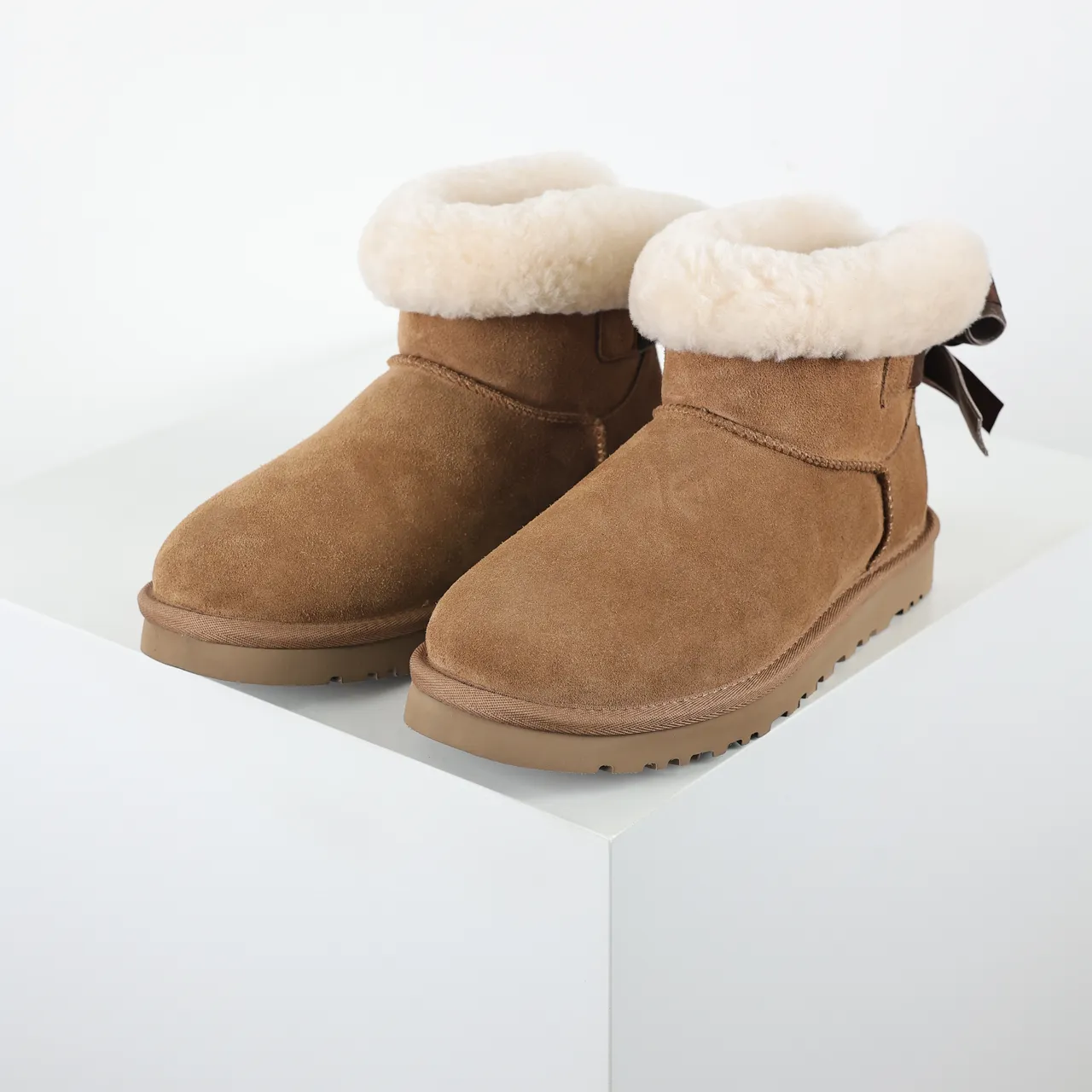 UGG Classic Mini Bow Tan Suede Ankle Boots