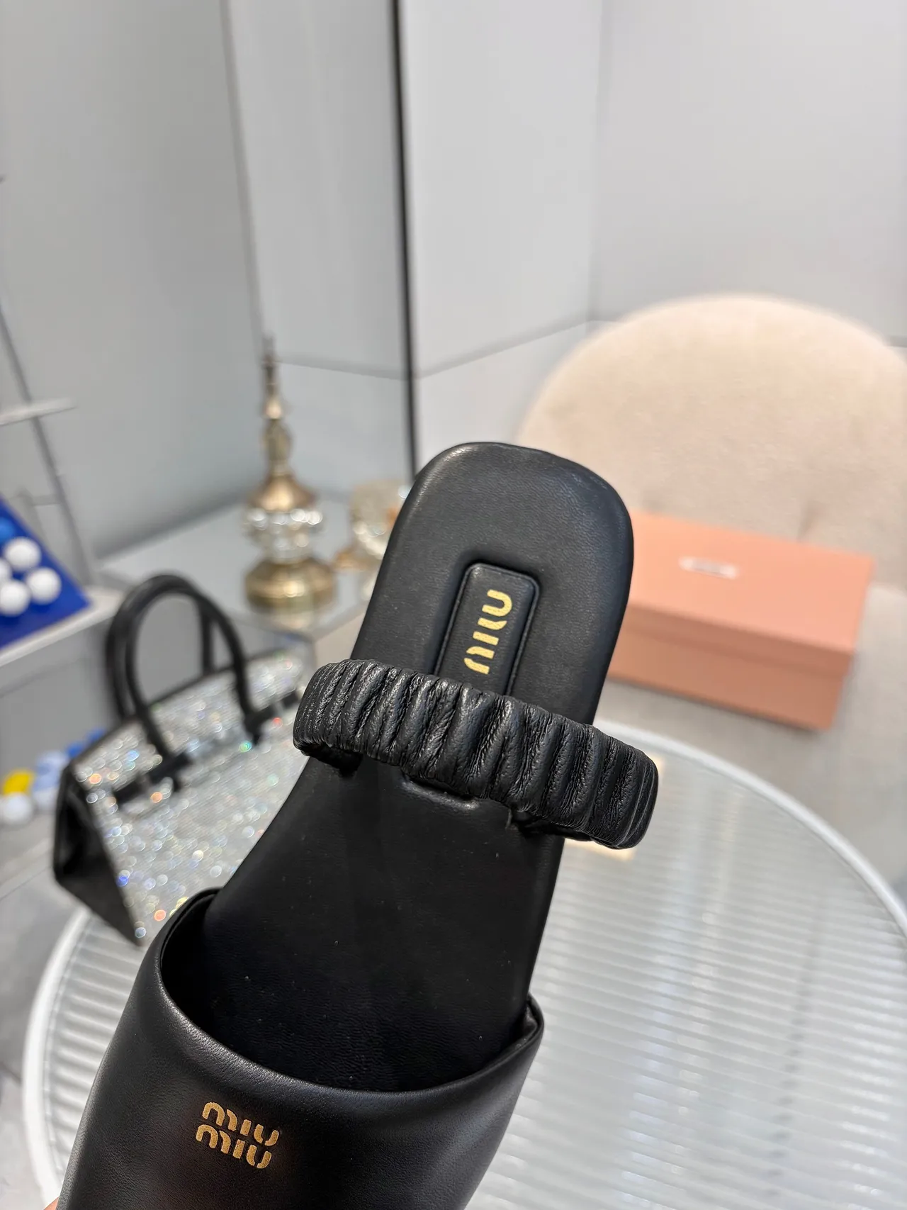 Miu Miu Black Gold Ruched Knotted Strap Logo Plaque Slippers
