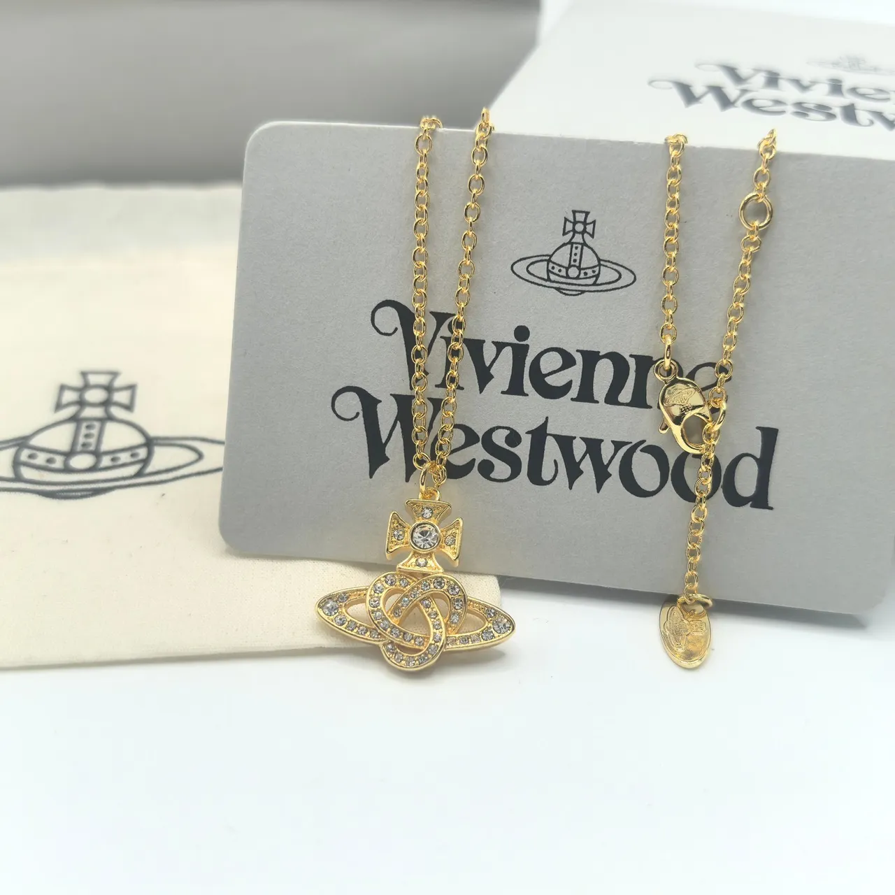 Vivienne Westwood Orb Pendant Necklace Gold and Silver Crystal Necklaces