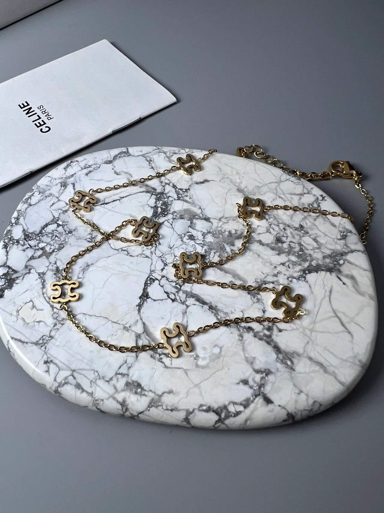 Celine Triomphe Puzzle Motif Gold and Black Enamel Necklace