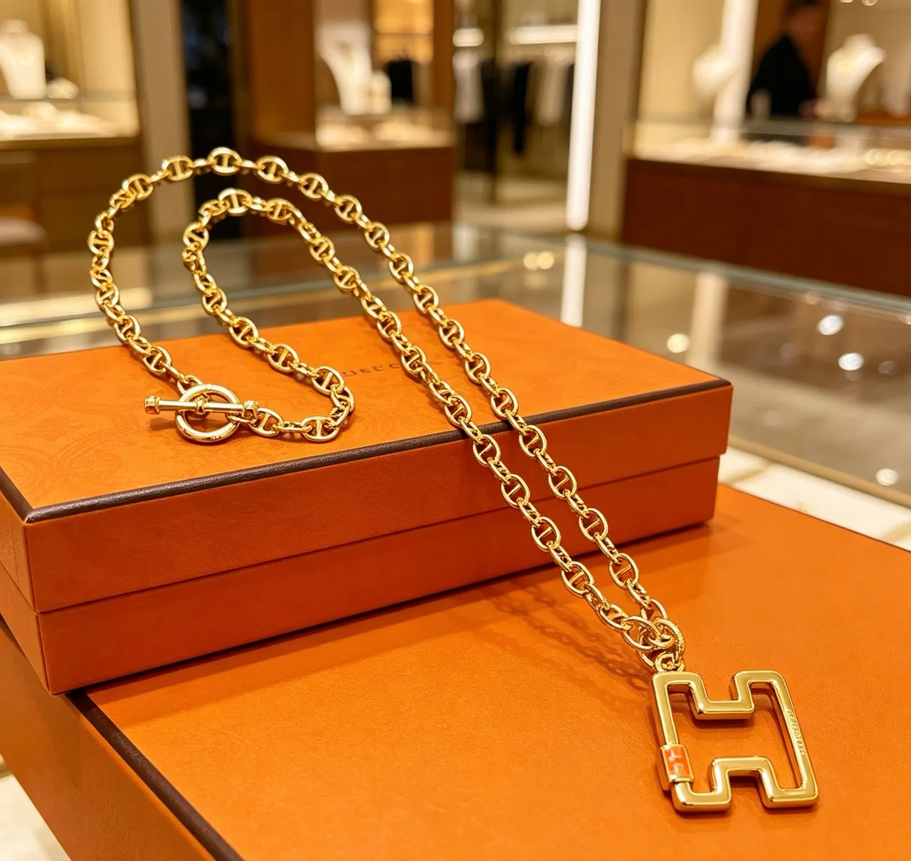 Hermès Gold Orange Link Chain Toggle Clasp Necklace