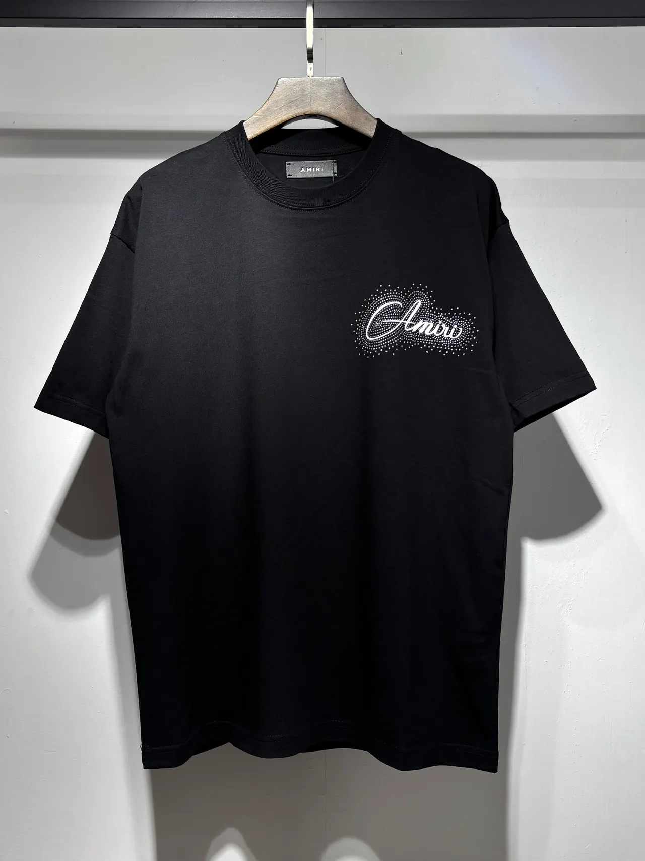 Amiri Graphic Script Dot-Matrix Logo T-Shirt