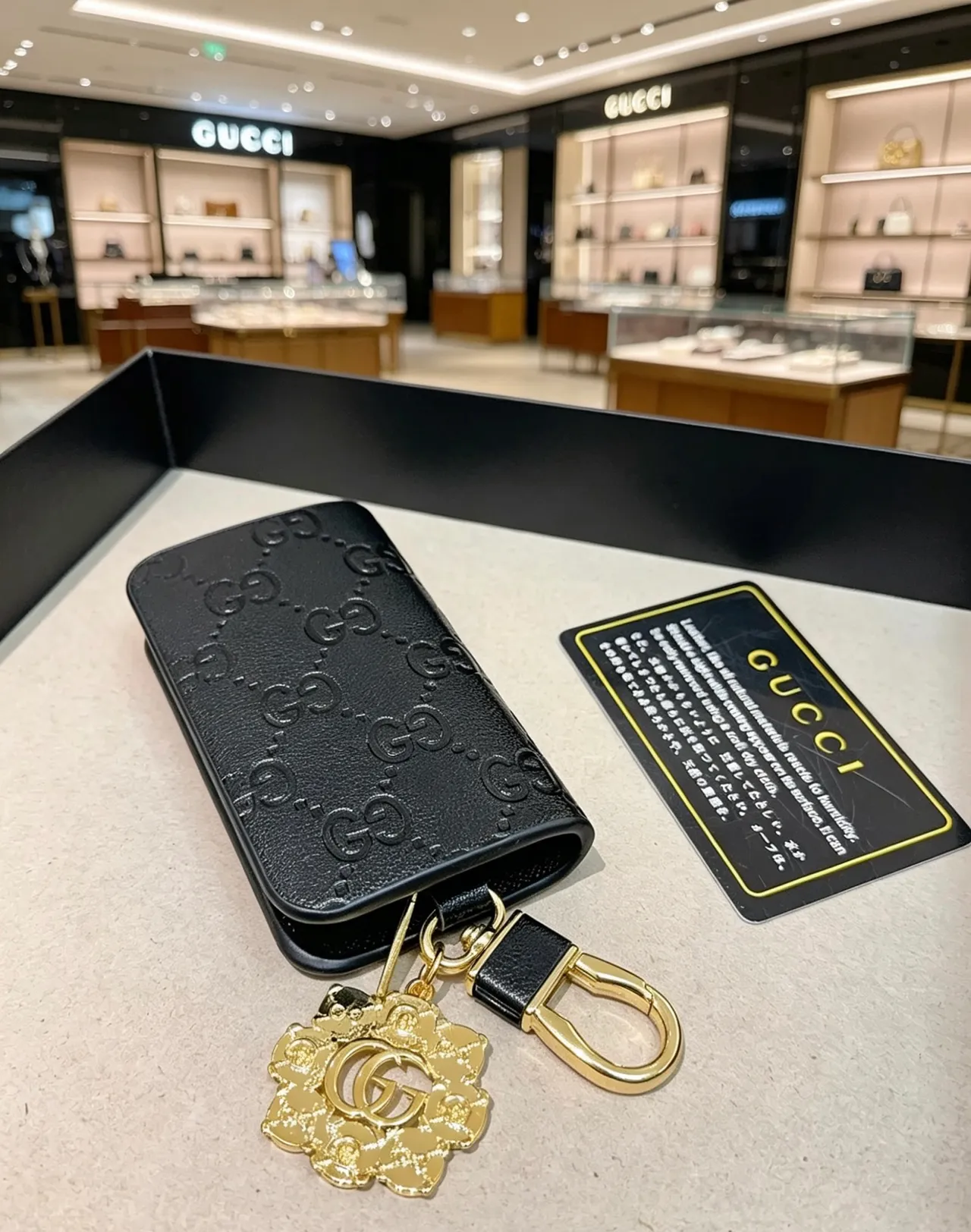 Gucci GG Monogram Black Gold Embossed Hardware Card Holder