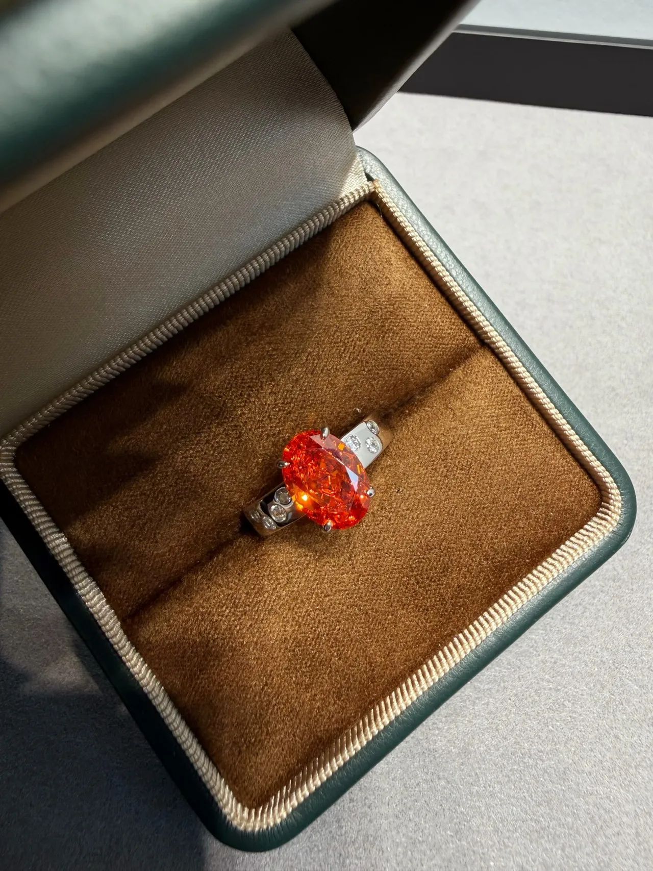 Orange Silver Oval-Cut Center Stone Four-Prong Solitaire Setting Ring