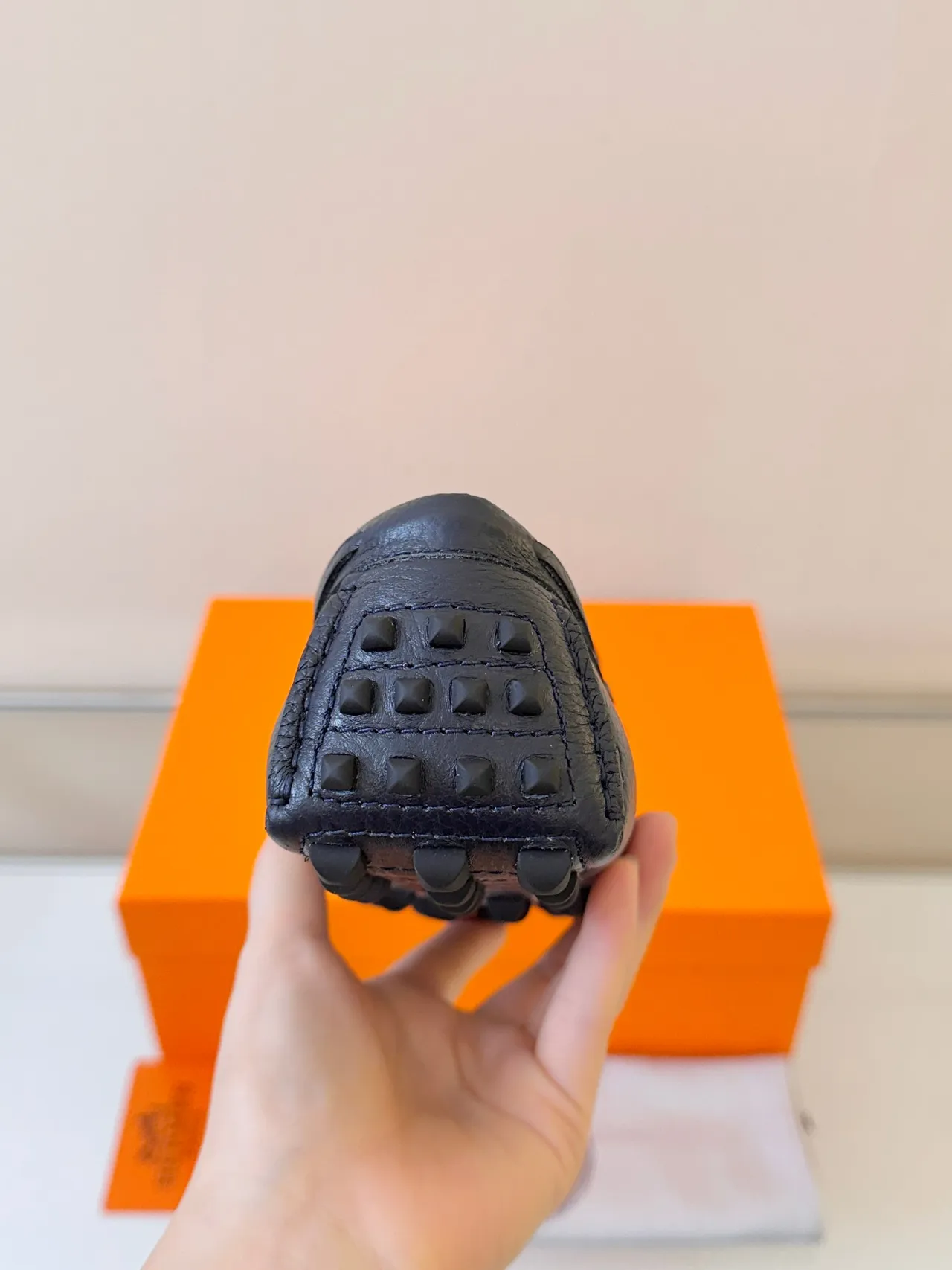 Hermès Oran Black Orange Pebbled Leather Braided Trim Loafer